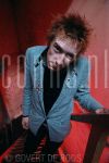 06-01-1977 Johnny Rotten with Sex Pistols at Paradiso Amsterdam

[keywords]Singer, Eyecontact, Smiling, Posed, Full Length, Stairs[/keywords]